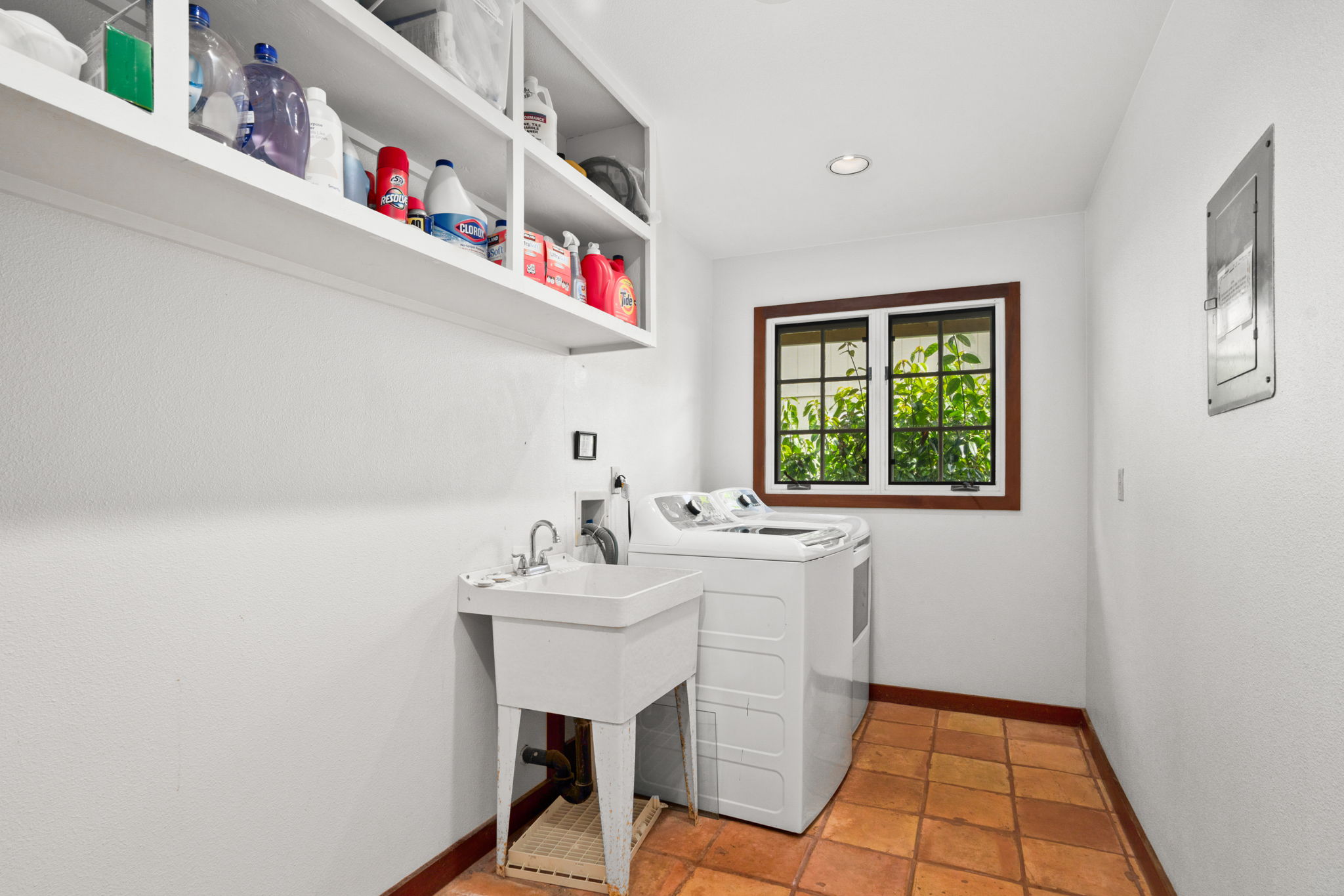 Laundry: Washer, dryer, and utility space for longer stays